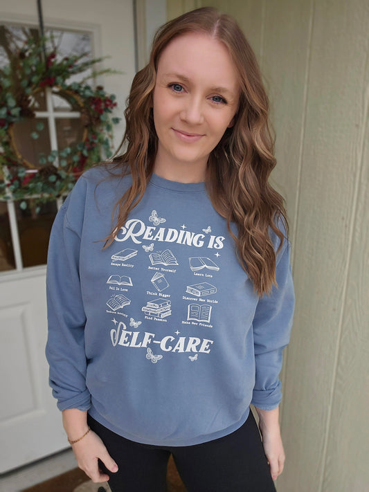 READING IS SELF-CARE Denim Blue Vintage Wash Crewneck