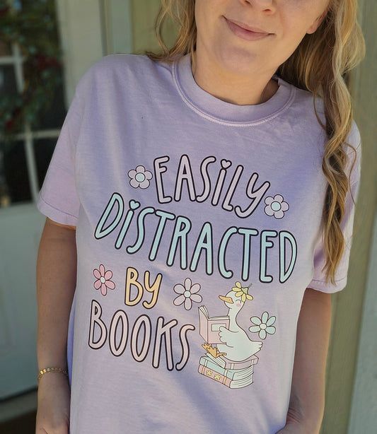 EASILY DISTRACTED BY BOOKS Lavender Vintage Wash Tee
