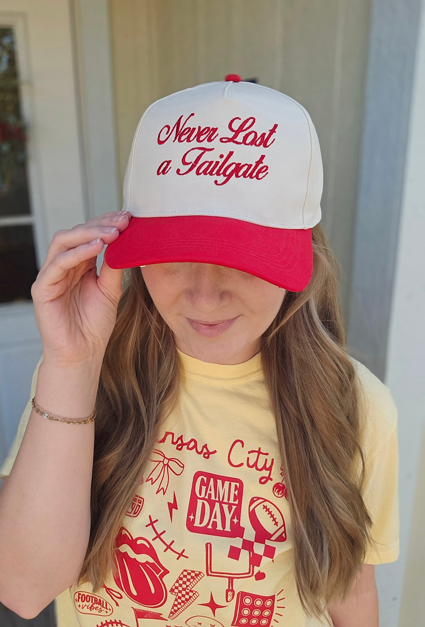 NEVER LOST A TAILGATE Embroidered Red/Beige Trucker Hat