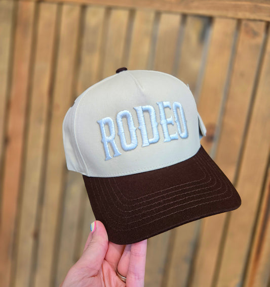 RODEO Puff Embroidered Two-Tone Beige/Brown Trucker Hat